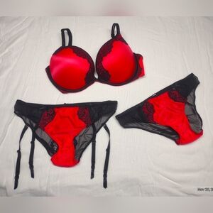 VS bra and (2) panty set. 34DD and medium for panties. One is garter style.